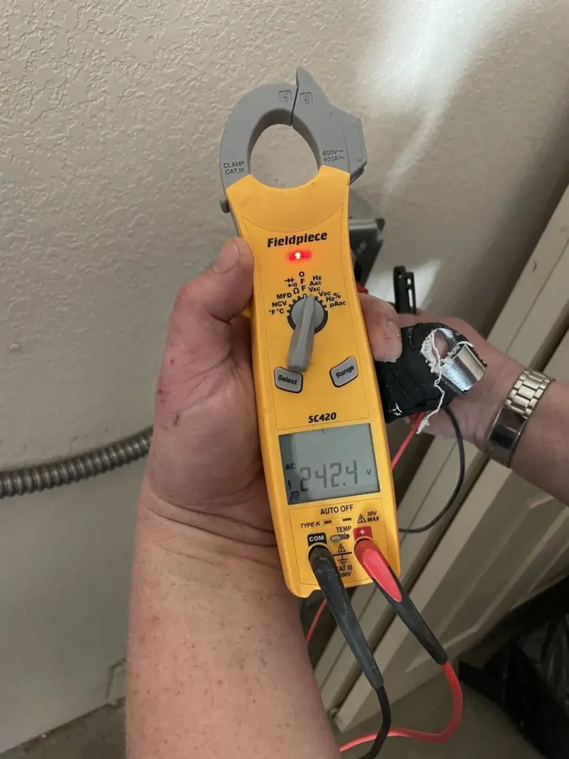 Voltage testing with clamp meter during Electrical Installation Services in Pryor Creek